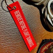 Remove Before Flight Dumbass Keychain