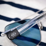Randolph Engineering Aviator Sunglasses with Blue Hydro lens - pilot sunglasses close up of RE 1973 Logo